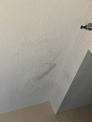 Dirty and the ceiling is peeling off.