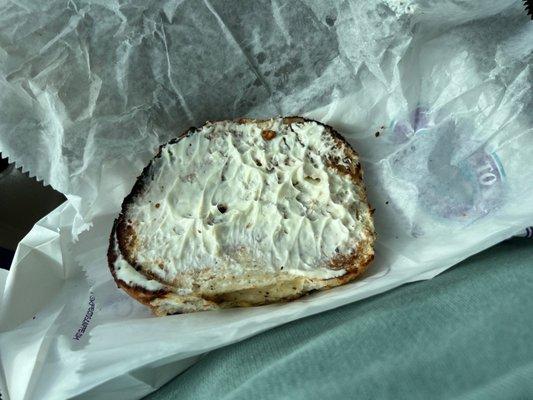 $1.60 for cream cheese on a bagel.