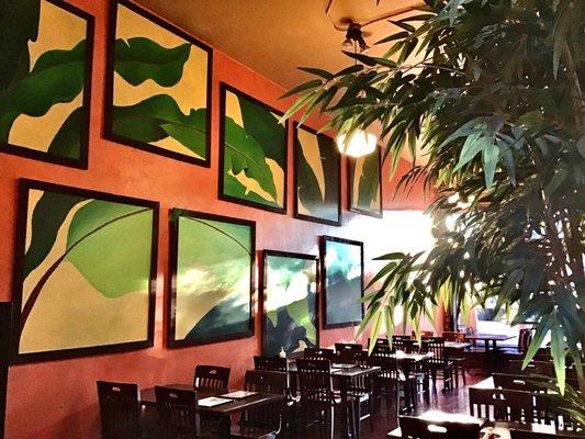 Dining area with wall art.