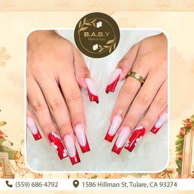 Keep it classic with a twist of holiday glam! French tips are always in style. Add a touch of festive sparkle for your holiday nails!