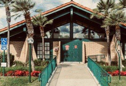 The front of the clubhouse/recreation center. I love the green...and I've been allowed to go in with my friend before, it's really nice!