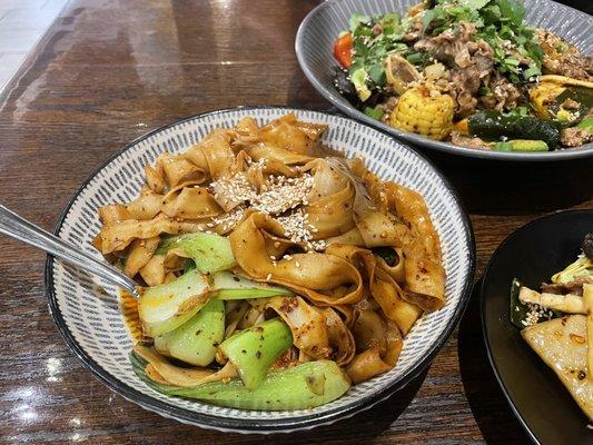 Oil Spill Noodles with Brisket Mala Pot in the background