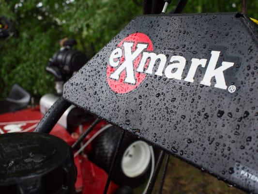 Exmark lawn mower during a passing shower.