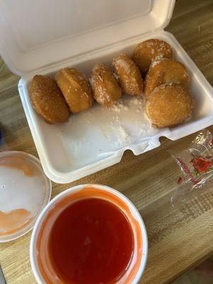 Sugar donut and sweet and sour sauce