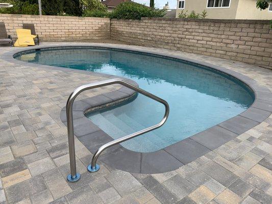 renovated pool with micro-pebbletech surface that doesn't hurt little kids feet. and our new decking