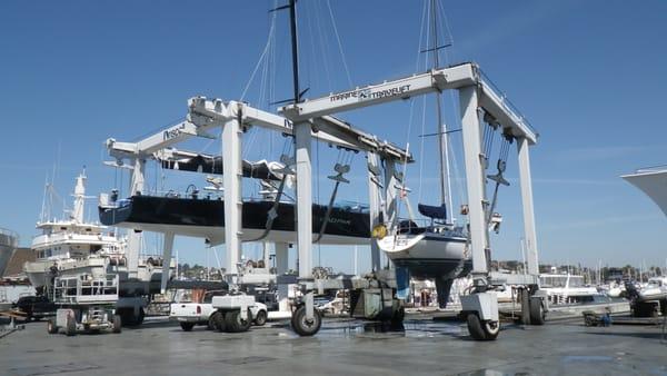 And I bet the owner of the giant boat next to mine knows who to take his MEGA RACE Boat to.  Mine's a Cal 31 (31'6" LOA).