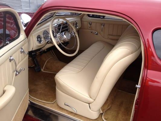 A 48 Buick Fastback we did entire interior in leather hand made door panels custom headliner and carpet