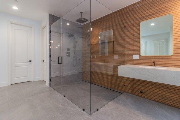 Frameless 90 Degree Shower Door with Starfire Ultra Clear Glass. This was an oversized enclosure nearly 7 ft wide across the front