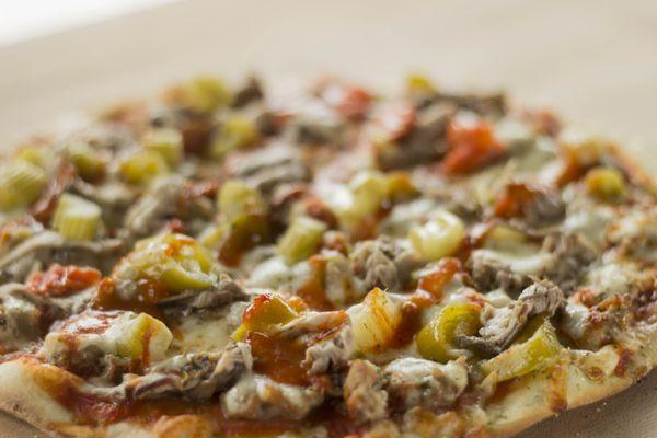 Like spicy?  Try our Great Chicago Fire pizza with giardiniera peppers, spicy Italian sausage, Italian beef, and a habanero drizzle!