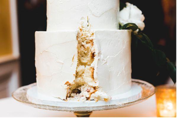 Asked Rhiannon for a simple cake with taller tiers, a "plaster-like" texture, & for greenery to trail down the cake. Fresh strawberry layer.