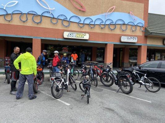 13 bikes in front of Subway.