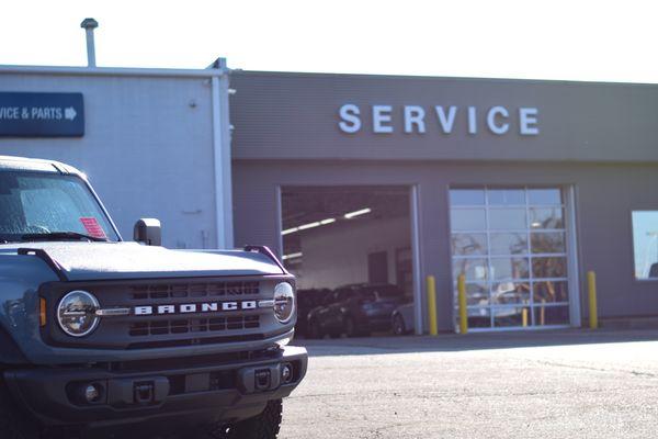 A new Ford Bronco sitting on the lot just outside our Service Bay doors waiting for Pick up!