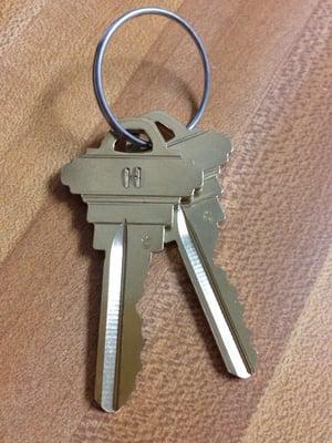 They stamped initials on my keys to keep the house and garage key easily identifiable