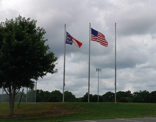 Flags flying in the wind at Ramblewood Park