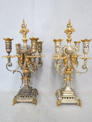 Gilding a candelabra before and after treatment