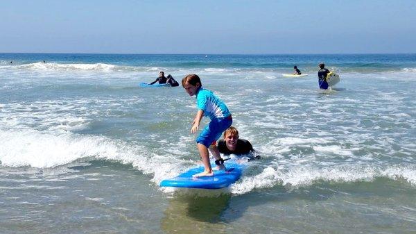 If your child wants to learn to surf, Aloha Beach Camp is the place to be.Surf instructor Shane will teach you how!