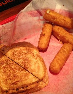 Grilled Tot and Cheese with a fatty side o' mozz sticks - yum.