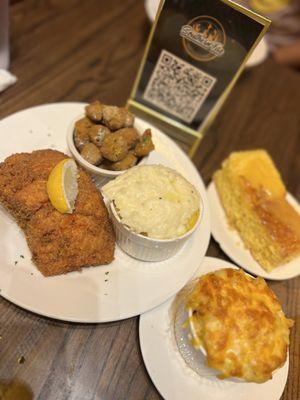 Fried Salmon with okra, mac and cheese, mashed potatoes, and cornbread