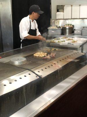 Chef on the hibachi grill