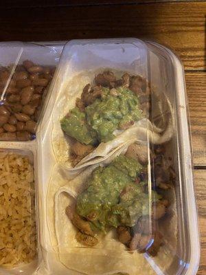 Tacos covered in guacamole!