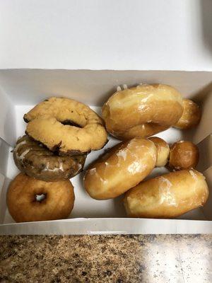 Donuts placed carelessly in box :-/