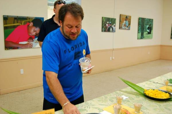 sampling and voting for the best mango species of the season