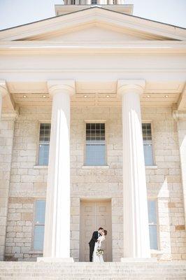 A kiss between the columns to seal the deal!