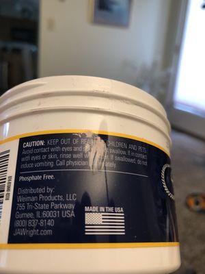 Polish on outside of container before I unscrewed lid.