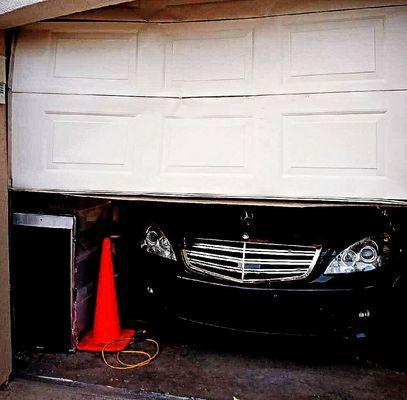 DAMAGED GARAGE DOOR INOPERABLE 100DEGREES DAILY!!!