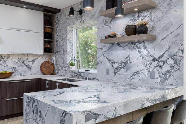 Caesarstone quartz and Calacutta marble countertops and accent walls, Newbury Park kitchen remodel