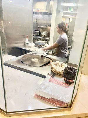 shes making Tanour Bread