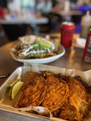 Birria tacos and Asada Chilaquiles in salsa verde.