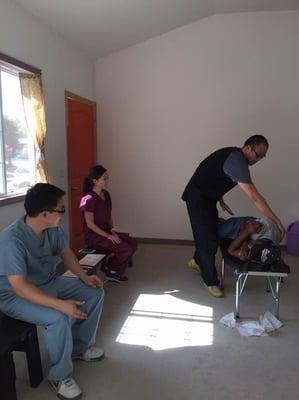 Medical Missions Director Dr. James of the Great Presbyterian Church treating patients in Ensenada.