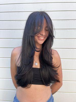 Long layers styled with a bouncy blowout done by Alissa Madrid