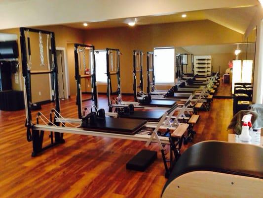 Group Pilates reformer class - five reformers including a rehab reformer!