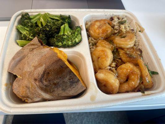 Shrimp over wild rice with side of sweet potato and roasted broccoi