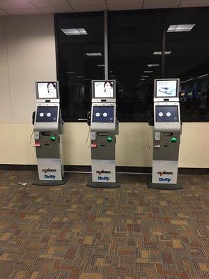 3 live agent kiosks available, but everybody is standing in line anyway to go to the counter.