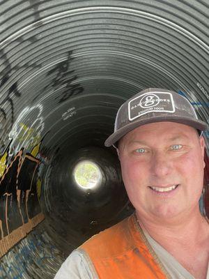 Survey of large storm drain pipe