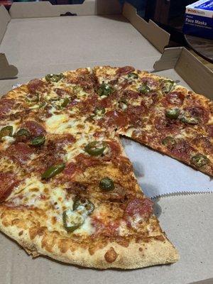 Pizza with Pepperoni, Jalapeños, and Bacon