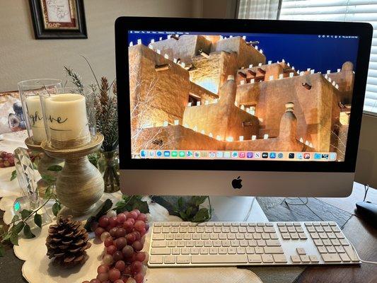 iMac, keyboard and mouse on a table