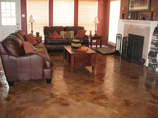 Here is a residential concrete stain with a urethane top coat with decorative integrated scoring for a unique custom look.