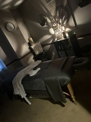 Warm, peaceful and welcoming massage therapy room.