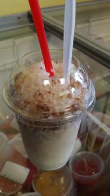 Raspado de coco con nuez.