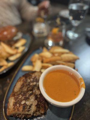 Short rib grilled cheese with tomato soup and side of French fries