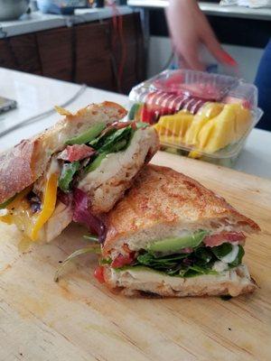 The vegetarian queso fresco sandwich and chopped fruit