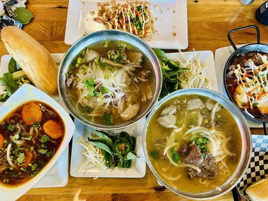 Beef stew, pho, sate noodles, grilled banh mi, eggs & filet skillet