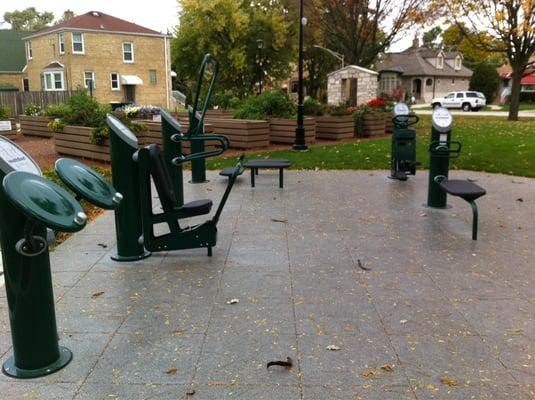 Outdoor exercise machines and community garden boxes