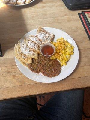 Turkey sausage patties, scrambled eggs, and waffles.