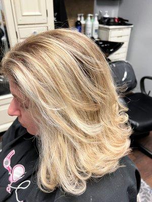 Two-toned highlights.   Medium length layers added for movement throughout the hair