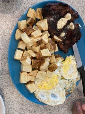 Steak, eggs, and potatoes